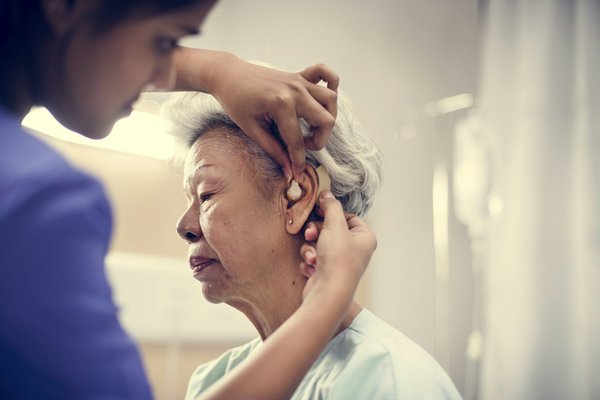 What Are the Critical Factors in Choosing the Right Type of Hearing Aid for Seniors with Hearing Loss?